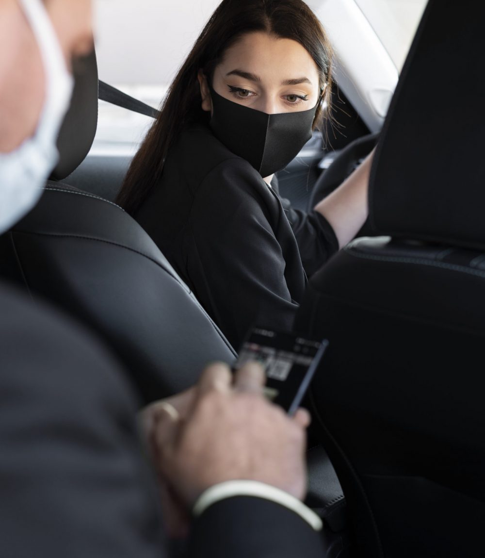 young-female-being-uber-driver-male-client (2)